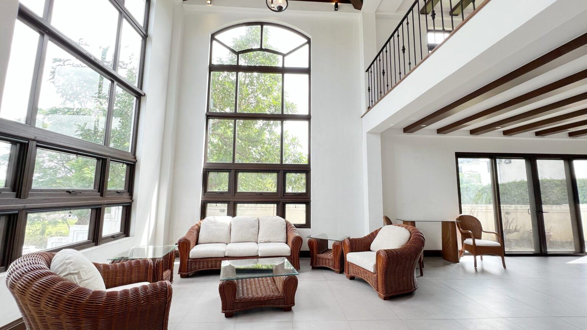 Sunlit double-height living room